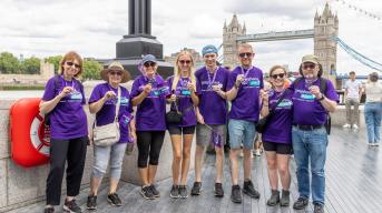 Group of walkers by London Tower Bridge