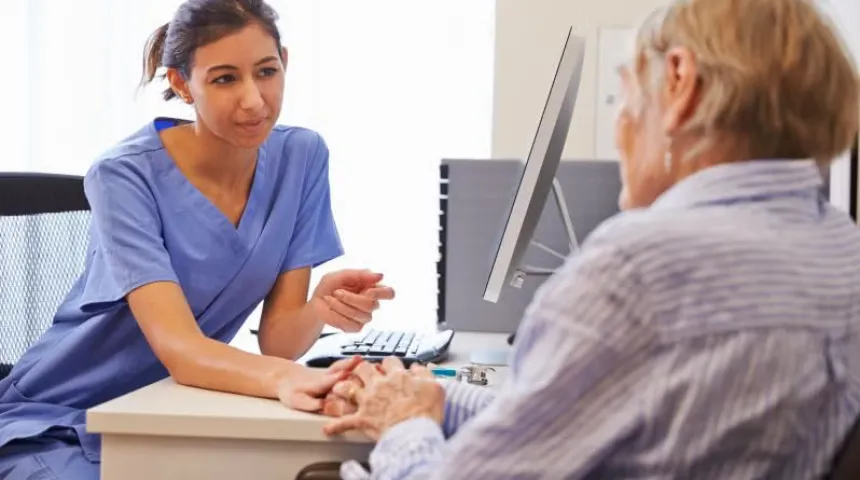 A doctor talking to a patient